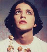 Brian Molko queer icon androgynous fashion style