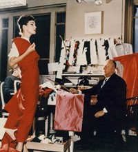 Christian Dior with model Lucky, circa 1955. Court