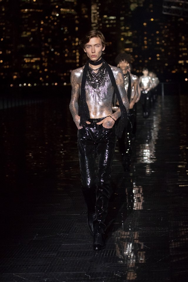 Anthony Vaccarello glitters with first Saint Laurent men's show